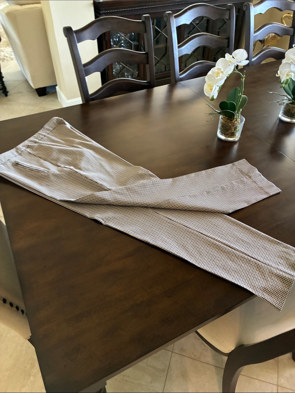 Ladies Brown Check Pants with side zip pocket detail.